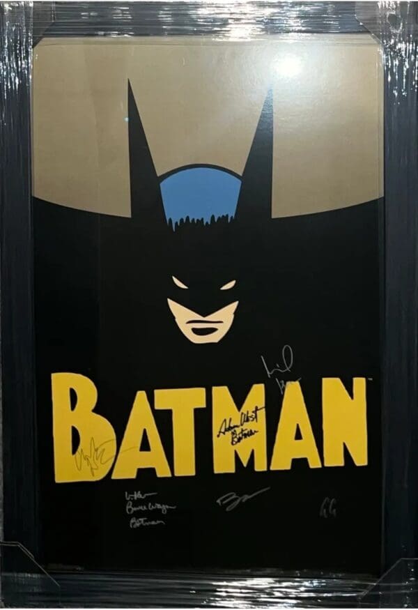 Framed Batman Autographed by the 6