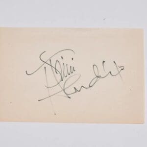 Autograph on a plain beige card.