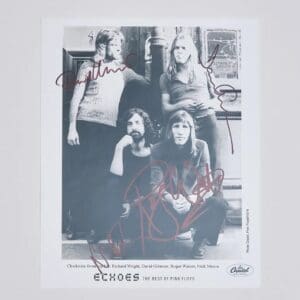 Black and white band photo with signatures.
