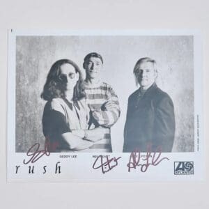 Black and white photo of three people.