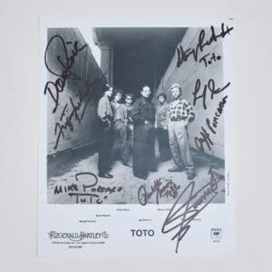 Black and white signed photo of a band.