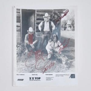 Signed black-and-white photo of ZZ Top.