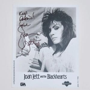 Autographed Joan Jett photo with guitar.