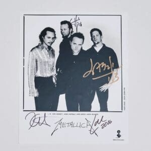 Black-and-white band photo with signatures.