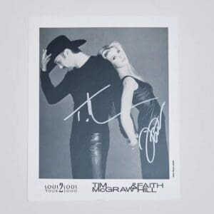 Signed promotional photo of a musical duo.