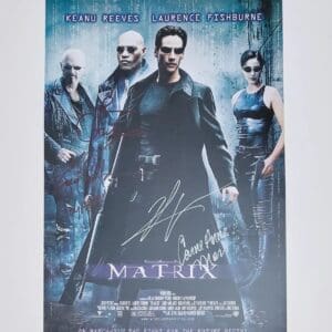 The Matrix movie poster with cast signatures.