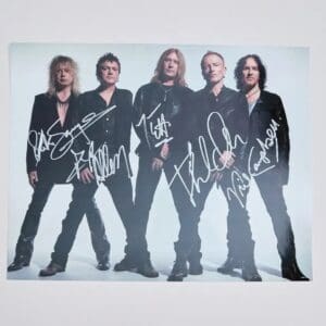 Five people in black outfits, autographed photo.