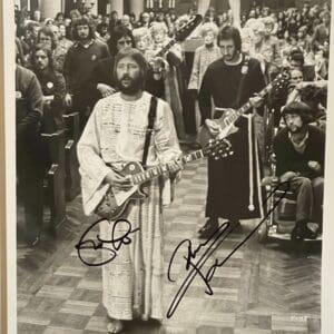 Musicians performing in a crowded church setting.