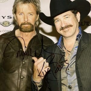 Two men posing at an event.