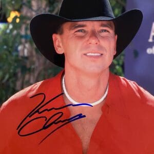Man in cowboy hat and red shirt.