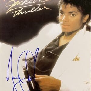 Album cover with signature and portrait.