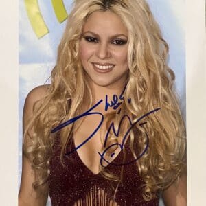 Smiling woman with long blonde hair.