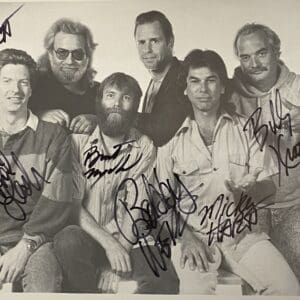 Group of six men with autographs.