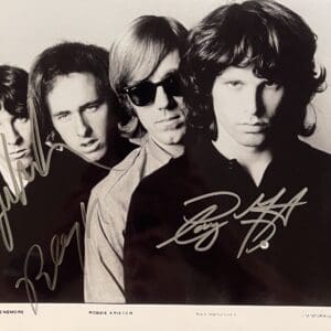 Four men in a black and white photo.
