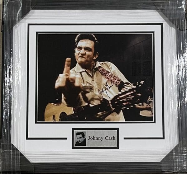 *Framed* Classic Johnny Cash Autographed 12x18 Photo "The Finger"