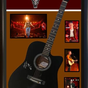 Framed guitar with concert photos and name.