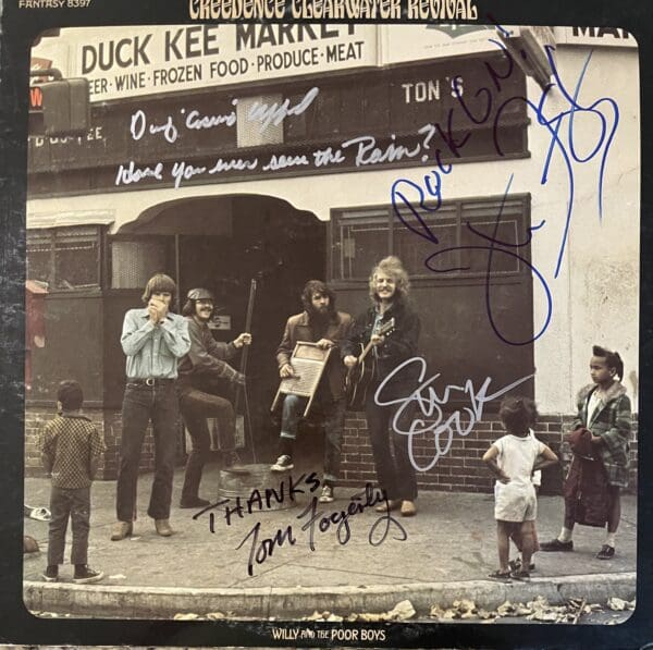 "Creedence Clearwater Revival " Autographed Album