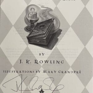 Harry Potter book cover with author's signature.