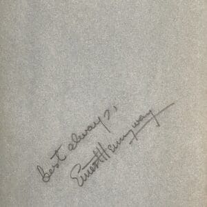 Handwritten note on textured paper background.