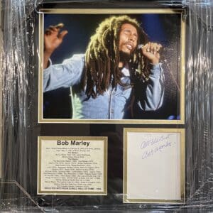 Framed Bob Marley photograph with signature.