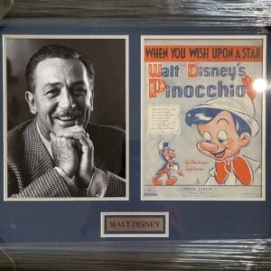 Framed photo and poster of Walt Disney.