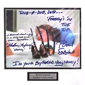 Freddy's glove emerging from bathtub, signed photo.
