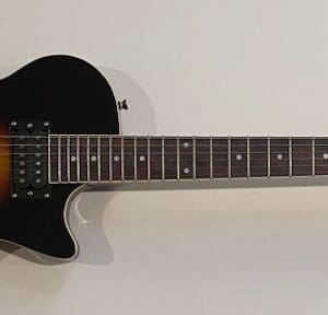 Sunburst electric guitar with autographs on body.