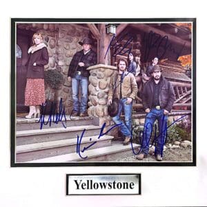 Cast of Yellowstone signed photo on porch.