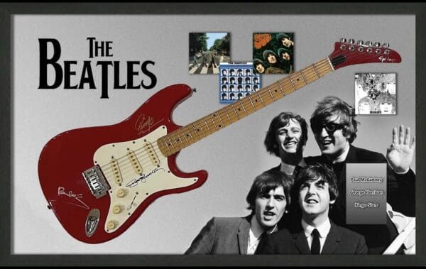 "The Beatles" Autographed Guitar