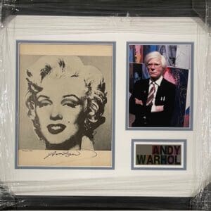 Framed artwork featuring Marilyn Monroe, Andy Warhol.