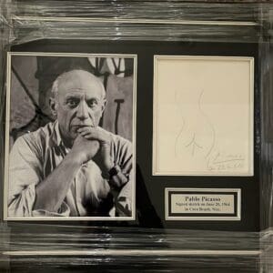 Framed photo and sketch of an artist.