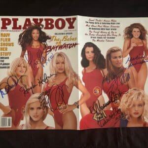 Magazine cover featuring women in swimsuits.