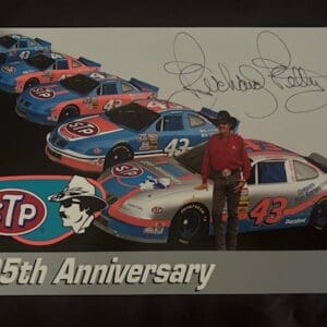 STP 25th Anniversary racing cars and signature.