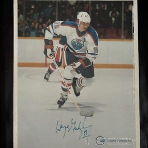 Hockey player skating on ice with autograph.