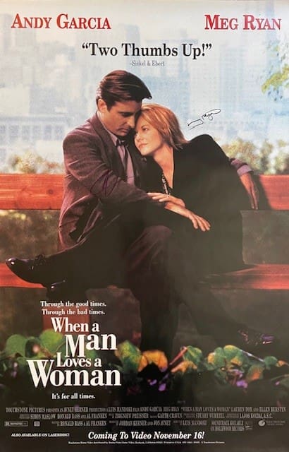Romantic movie poster with embracing couple.