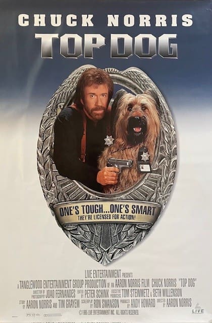 Movie poster featuring man and dog.