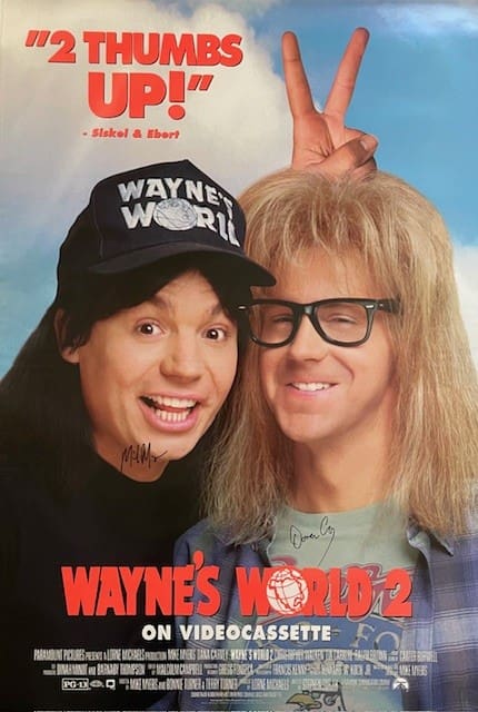 Two characters from Wayne's World 2 poster.