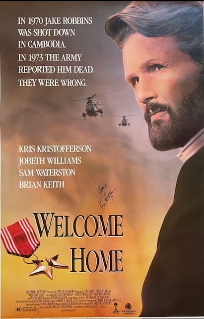 Man with helicopters and "Welcome Home" text.