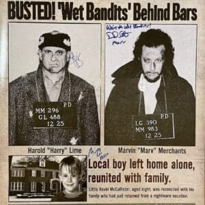 Home Alone newspaper with criminals' mugshots.