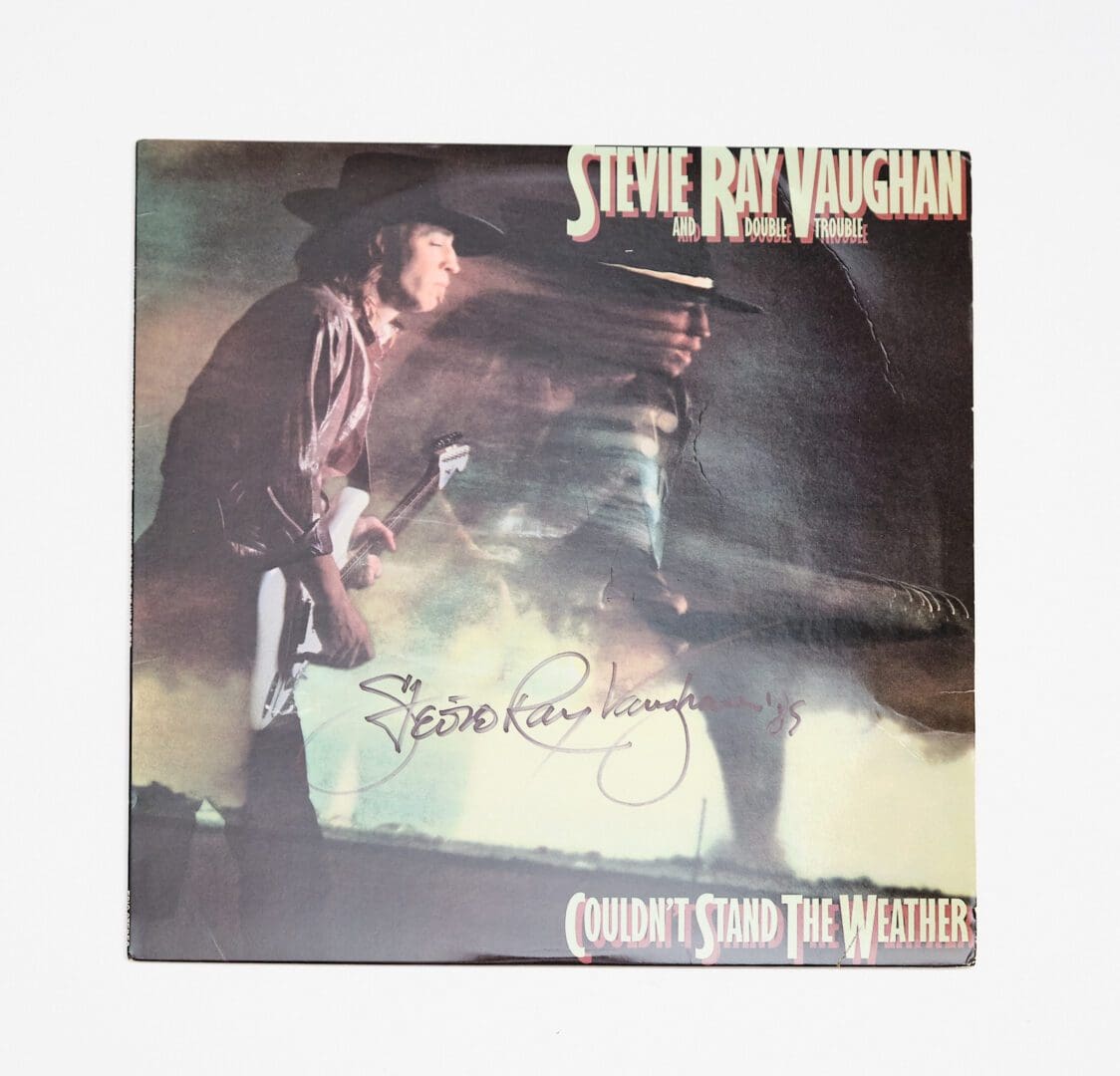 "Stevie Ray Vaughan" Autographed Album "Couldn't Stand The Weather"