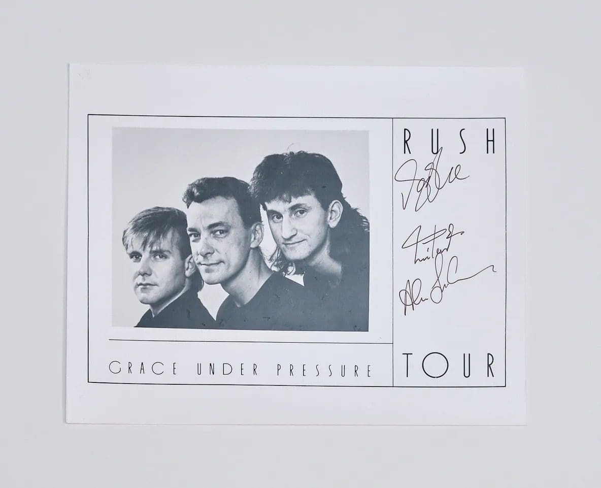 "Rush" Autographed 10x8 Photo