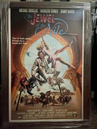 Framed "The Jewel of the Nile" Autographed Movie Poster