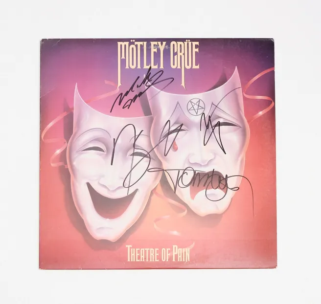 "Motley Crue" Band Signed Album "Theater of Pain"