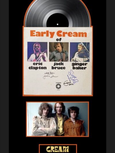 Cream band memorabilia with vinyl record display.