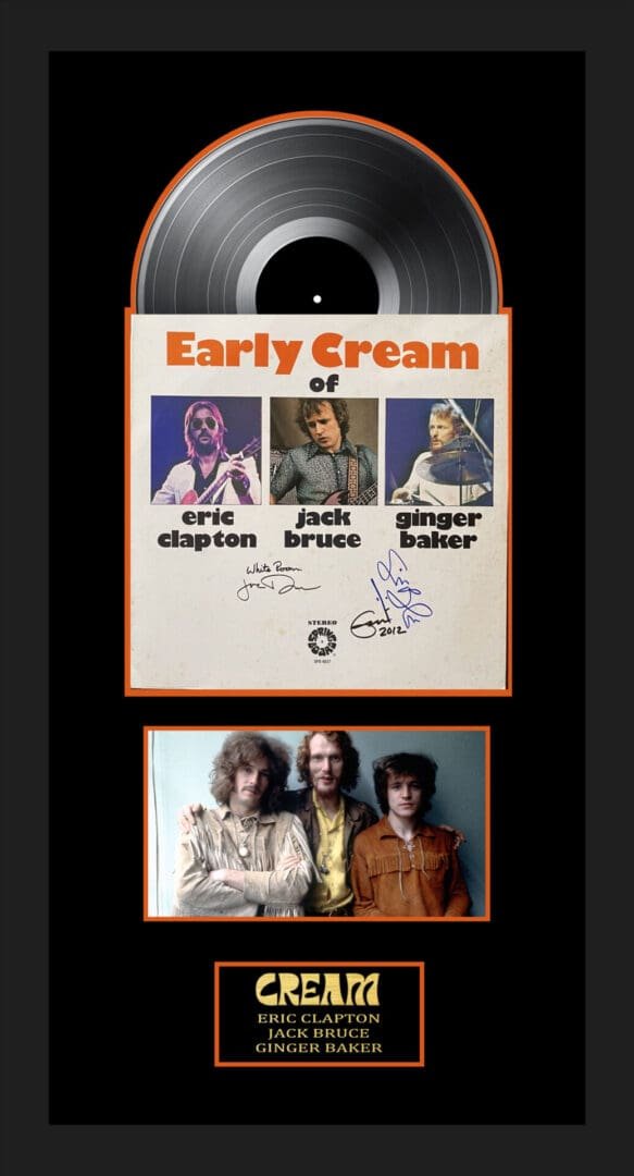 Cream band memorabilia with vinyl record display.