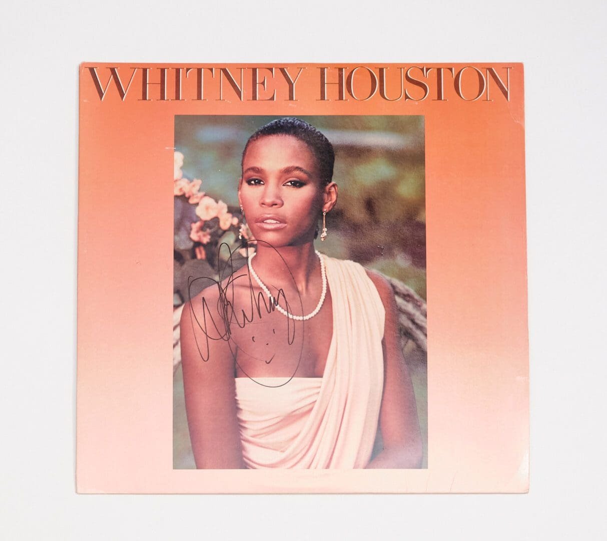 Album cover with a woman in white.
