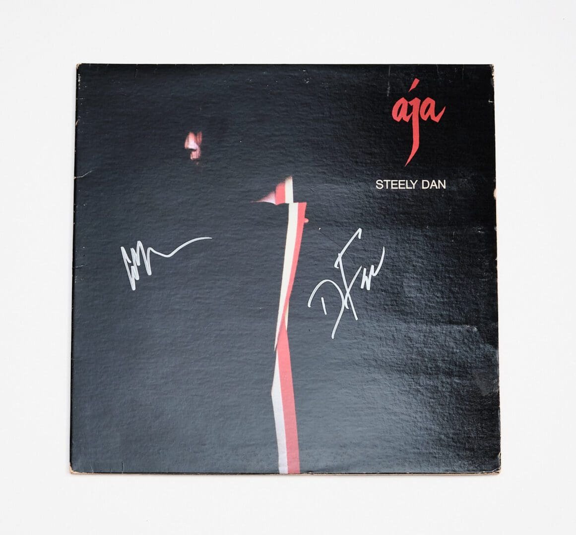 Steely Dan "Aja" album cover with signatures.