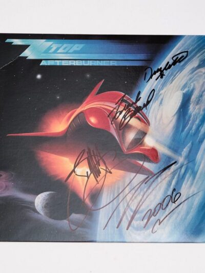 Signed "Afterburner" album with spaceship design.