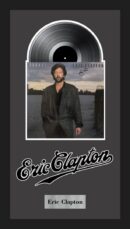 Album cover with man and vinyl record.