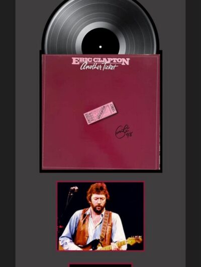 Eric Clapton album and performance photo.
